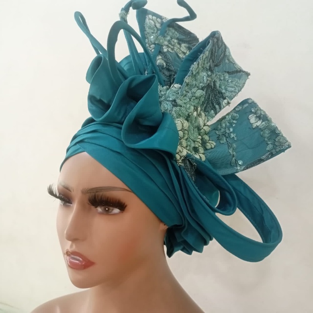 Elegant Teal Headwrap with Floral Accents

REASONABLE OFFERS ACCEPTED
GEL10 0326